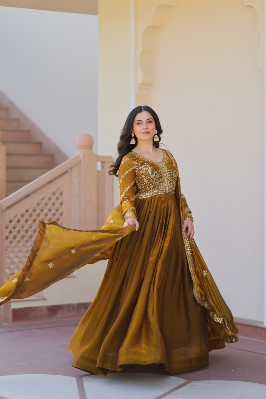 Mehandi Color Fendy Fabric With Zari Sequins Embroidered Work Gown