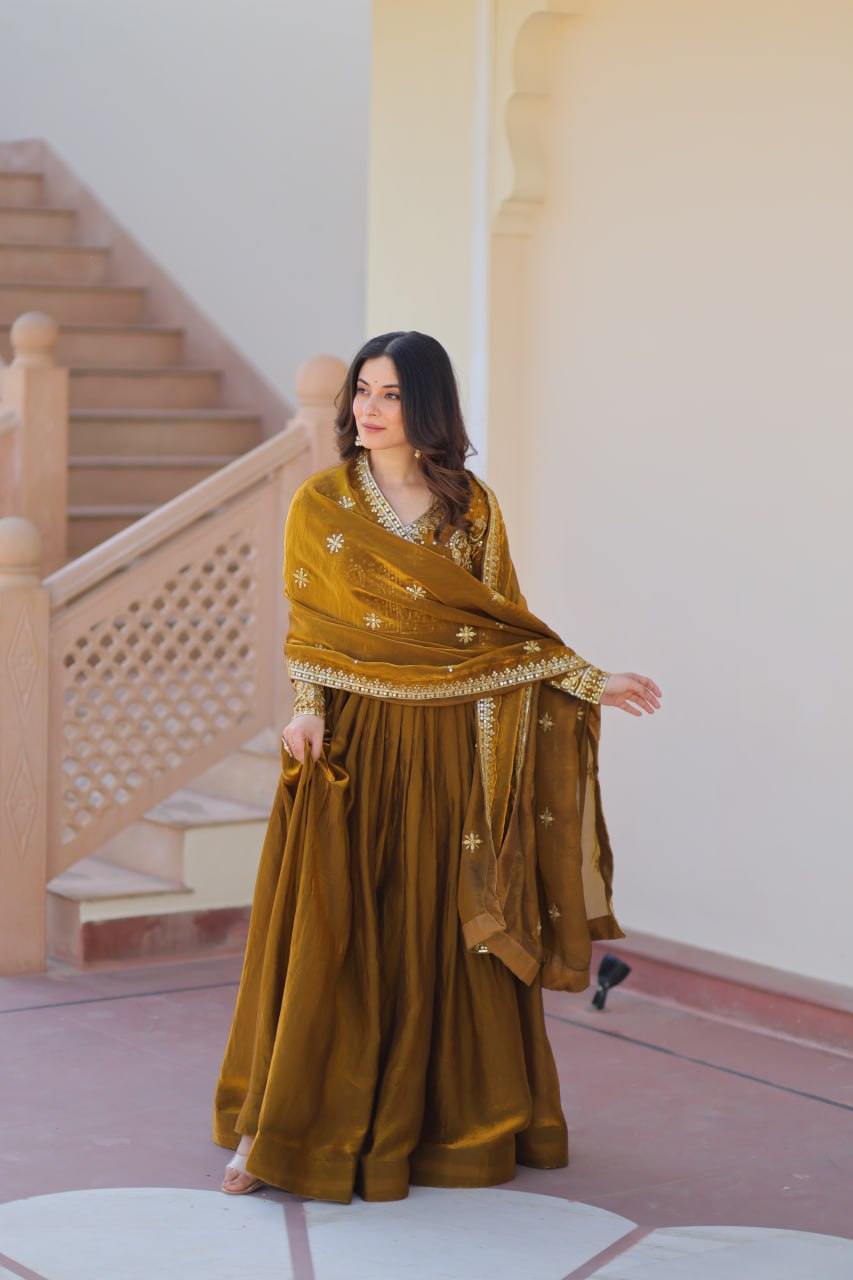 Mehandi Color Fendy Fabric With Zari Sequins Embroidered Work Gown