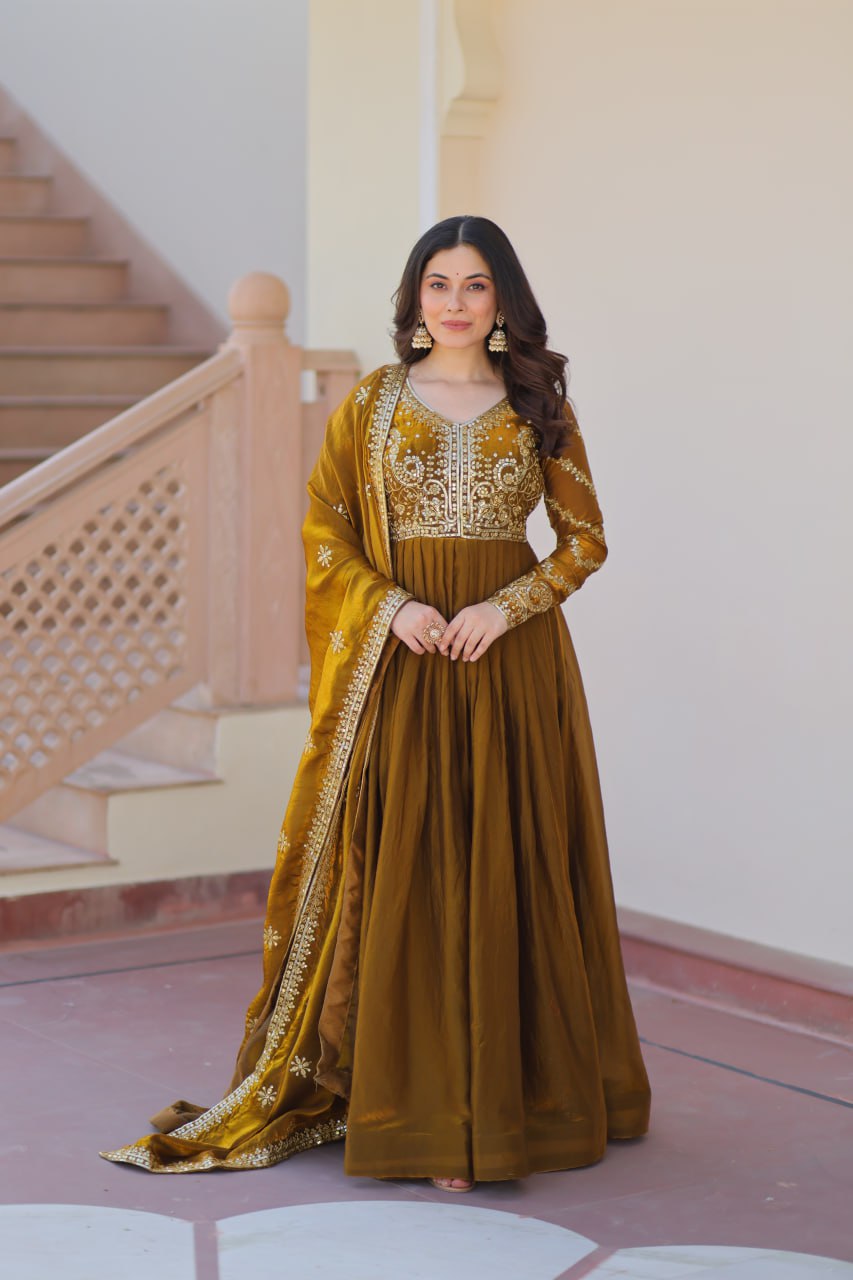 Mehandi Color Fendy Fabric With Zari Sequins Embroidered Work Gown