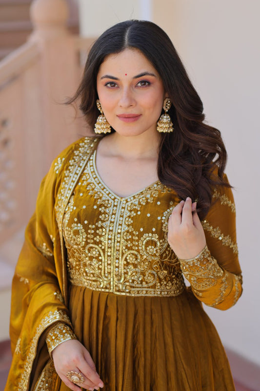 Mehandi Color Fendy Fabric With Zari Sequins Embroidered Work Gown