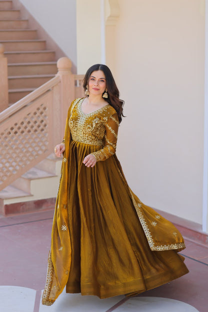 Mehandi Color Fendy Fabric With Zari Sequins Embroidered Work Gown