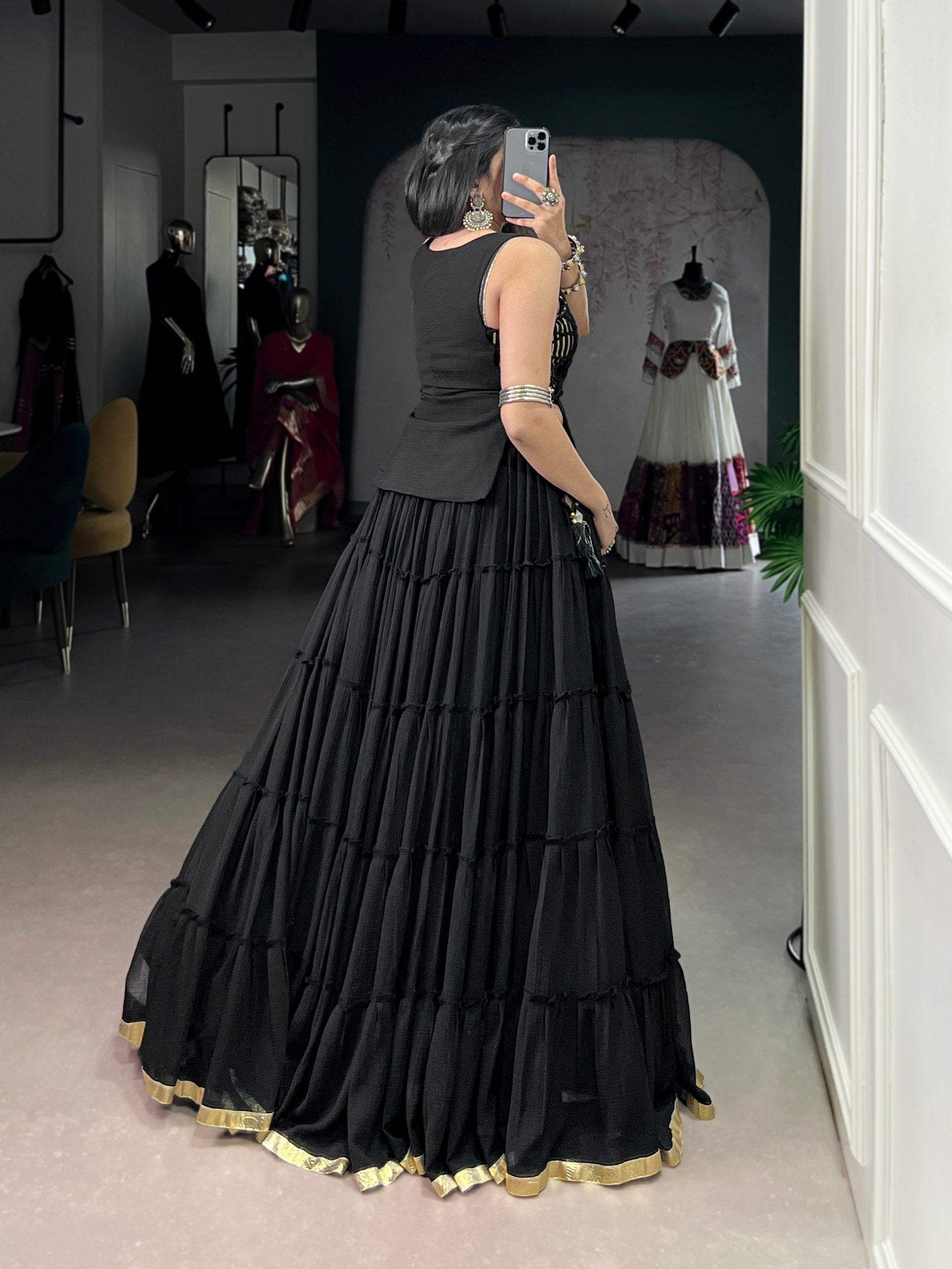 Modern Navratri lehenga black with feather-light flowing fabric
