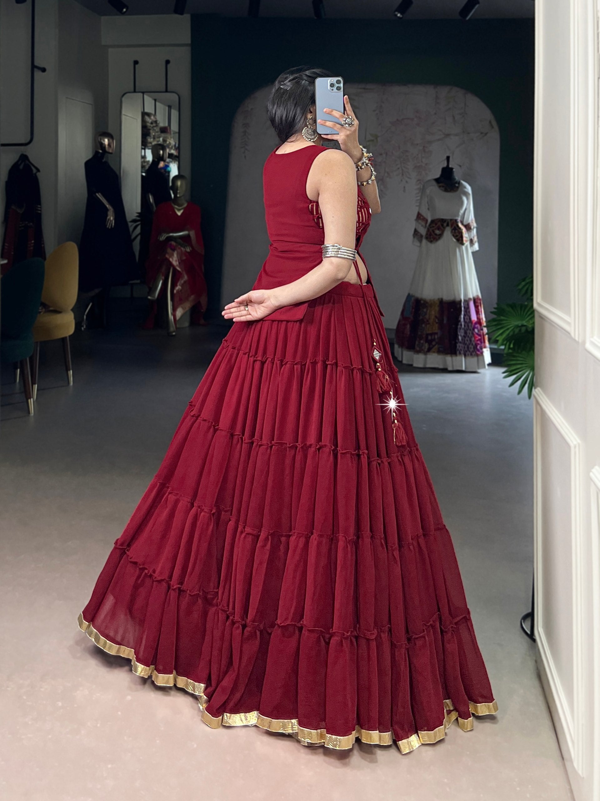 Modern Navratri lehenga maroon with feather-light flowing fabric
