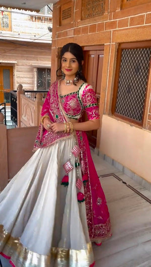Navratri lehenga off-white roman silk with pink dupatta and latkan tassels
