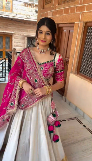 Garba chaniya choli white flared lehenga with gold zari border and pink blouse
