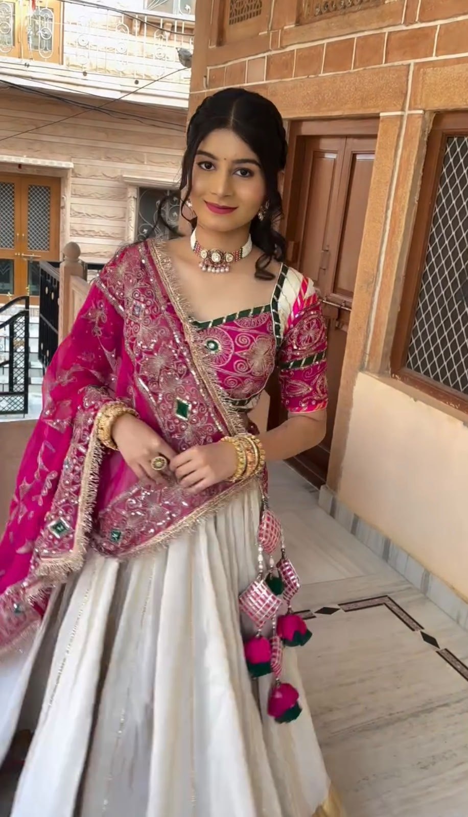 Garba chaniya choli white flared lehenga with gold zari border and pink blouse
