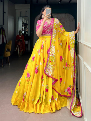 Yellow floral georgette lehenga choli with pink handwork blouse and printed dupatta

