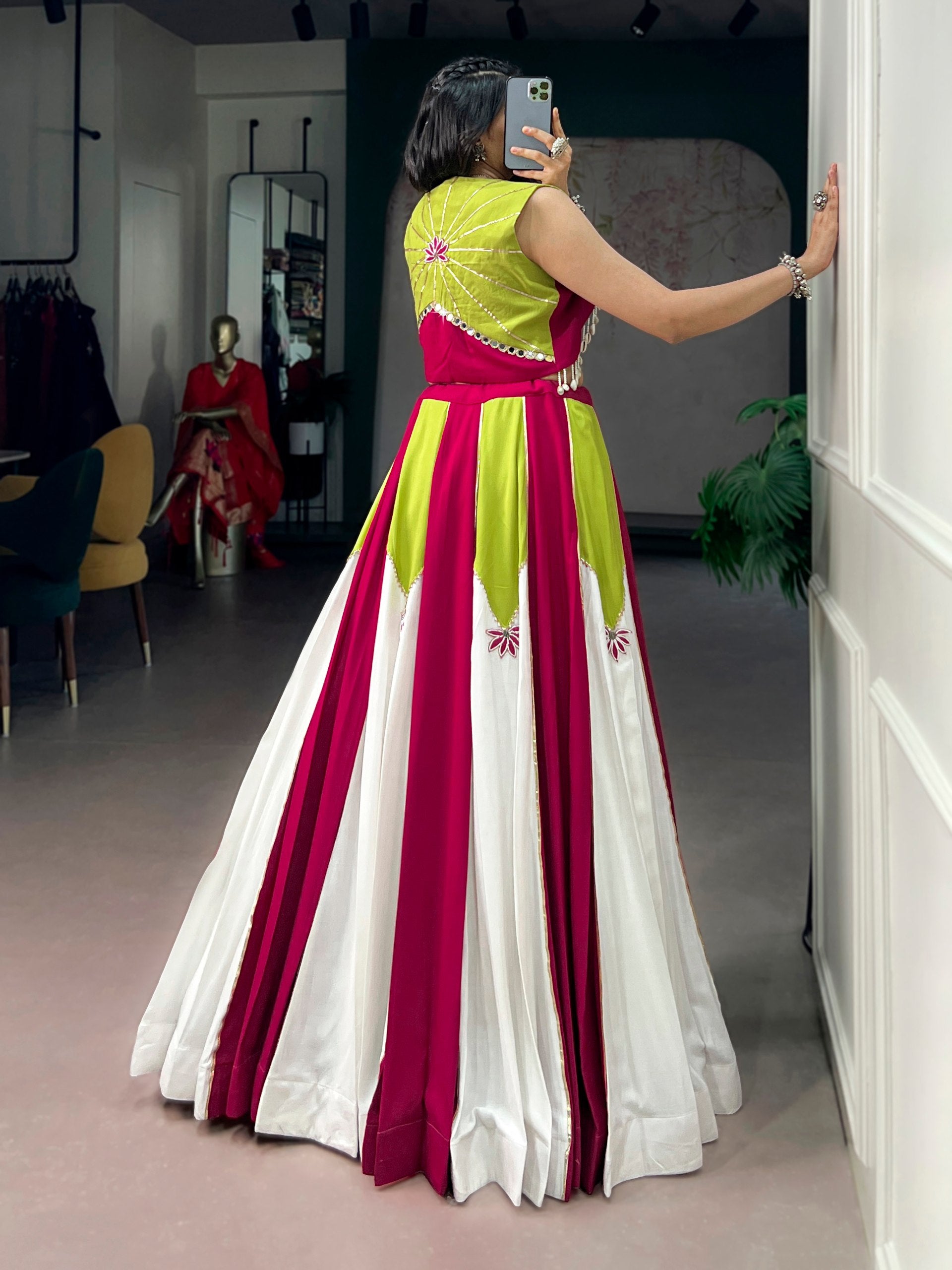 Designer chaniya choli with contrast panel and lotus motif embroidery
