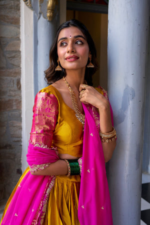 Half saree function mustard and pink silk set with zari border
