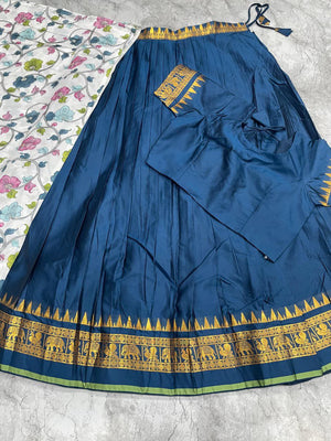 Half saree function blue lehenga with floral print dupatta and zari border
