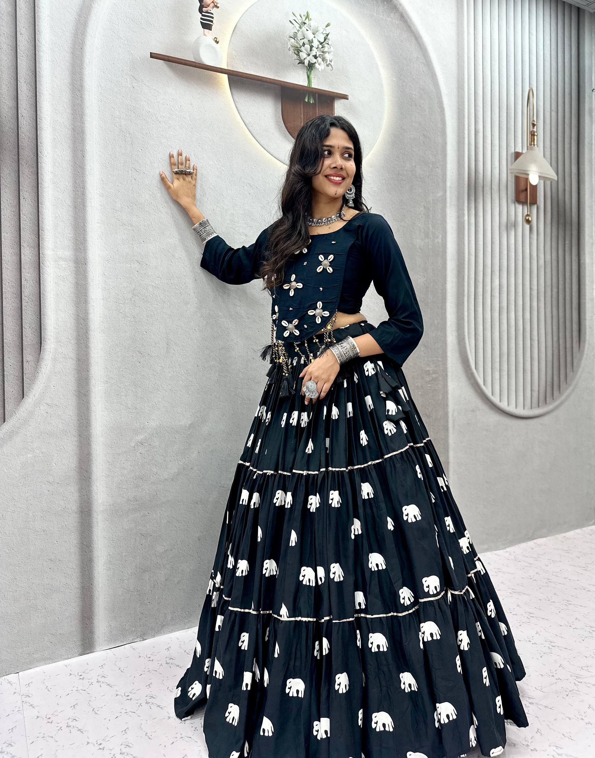 Navratri lehenga black cotton with cowrie shell mirror work crop top and latkans
