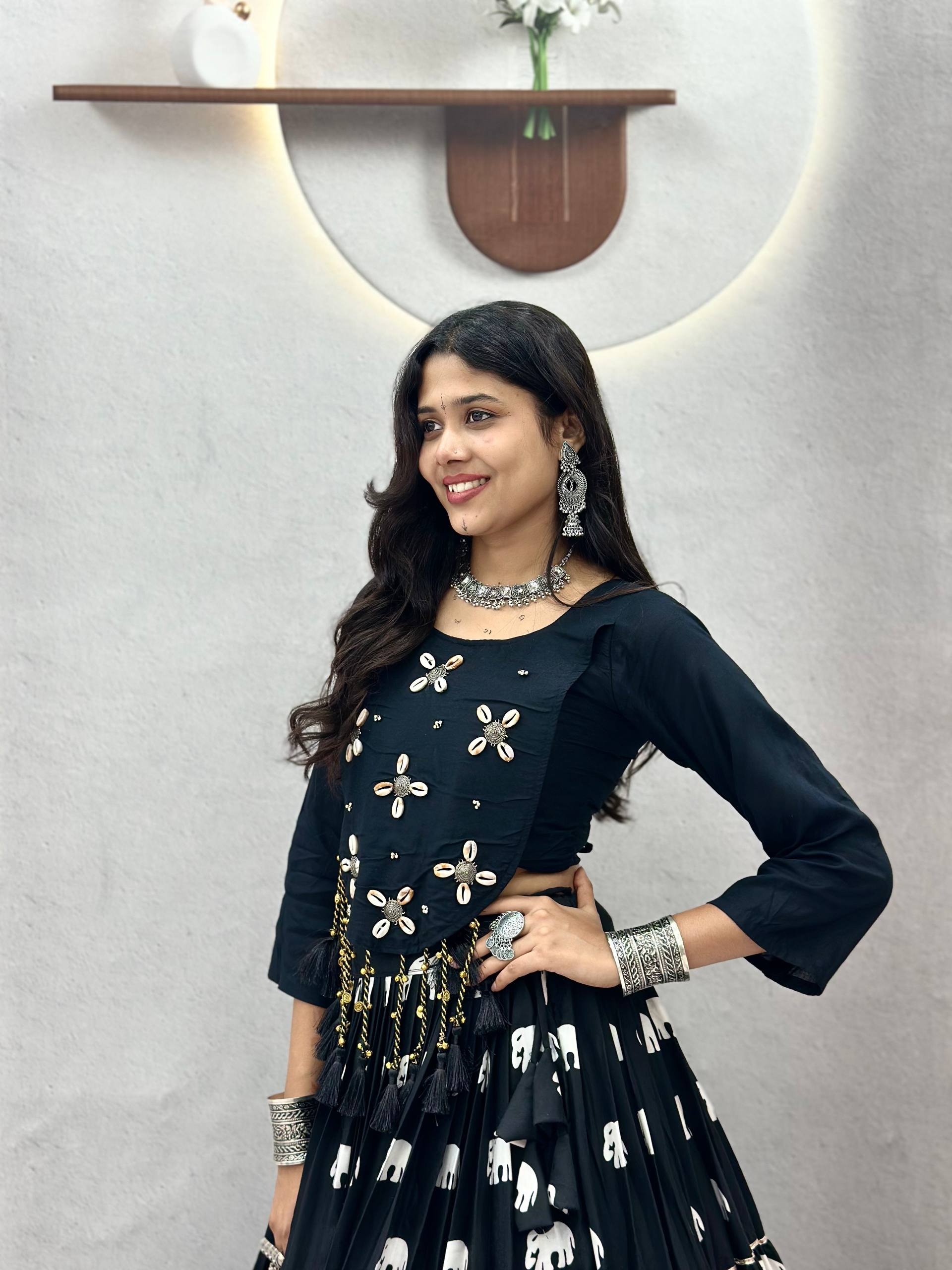 Garba chaniya choli black tiered skirt with white elephant motif and kodi blouse
