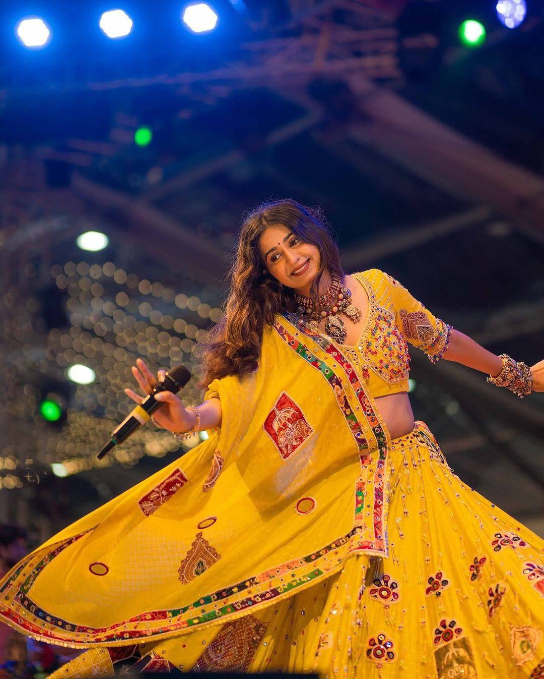 Mirror work choli with traditional Gujarati motifs
