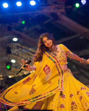 Mirror work choli with traditional Gujarati motifs
