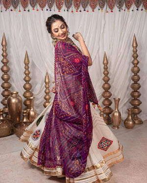 Traditional Gujarati Navratri chaniya choli cream with folk art print for garba
