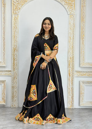 Black heavy rayon cotton Navratri chaniya choli with multicolour mirror and patch work border
