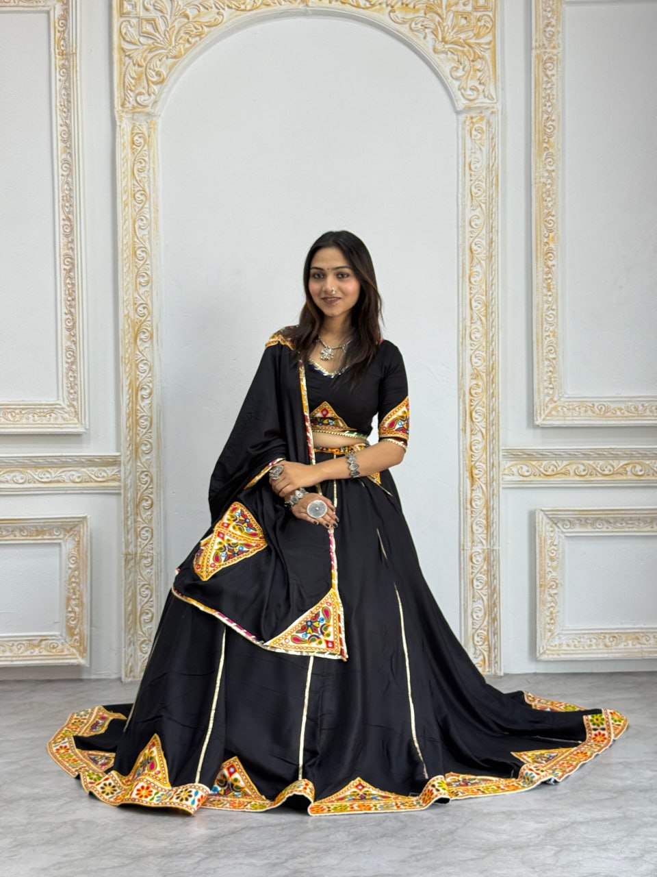 Traditional Gujarati Navratri chaniya choli black with mirror work for garba
