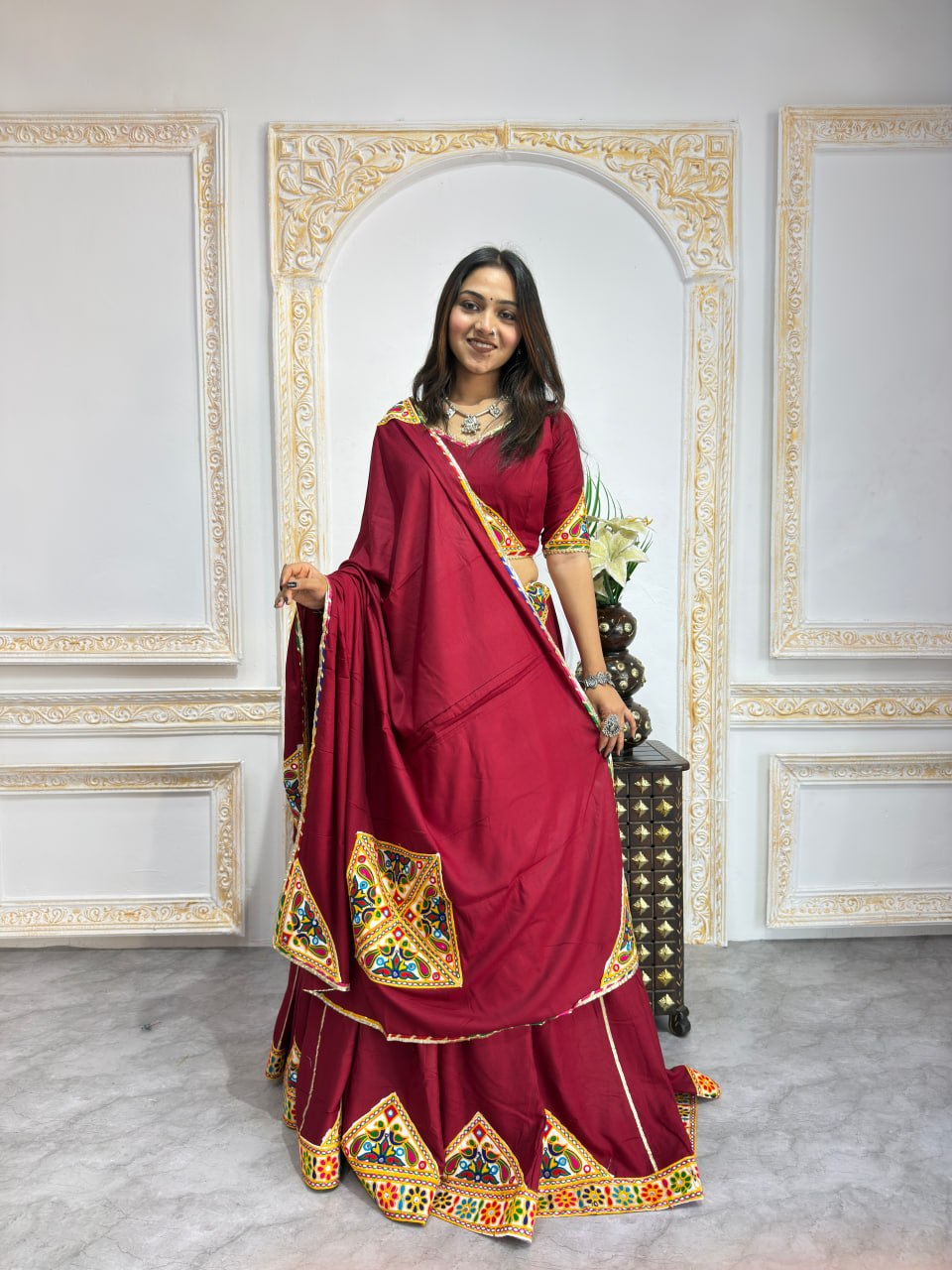 Maroon heavy rayon cotton Navratri chaniya choli with multicolour mirror and patch work border
