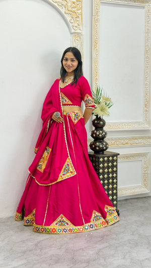 Garba chaniya choli rani pink with traditional mirror work border and dupatta
