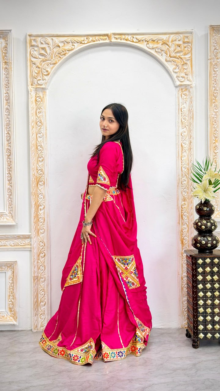Traditional Gujarati Navratri chaniya choli rani pink with mirror work for garba
