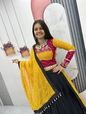 Navratri lehenga black rani pink with mirror work border and moti latkan dupatta
