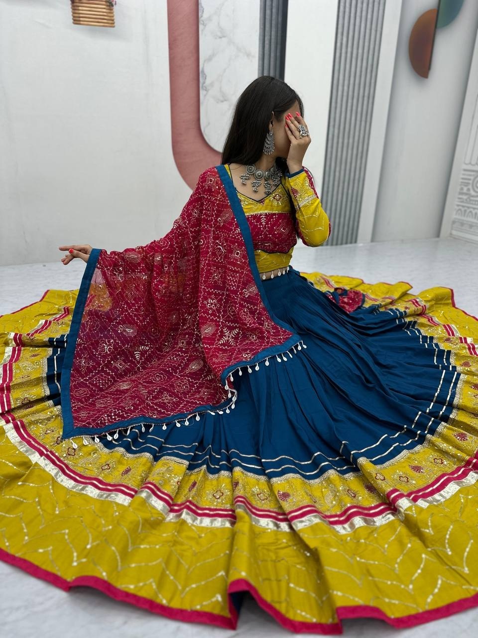 Traditional Gujarati Navratri chaniya choli teal blue with mirror thread work for garba
