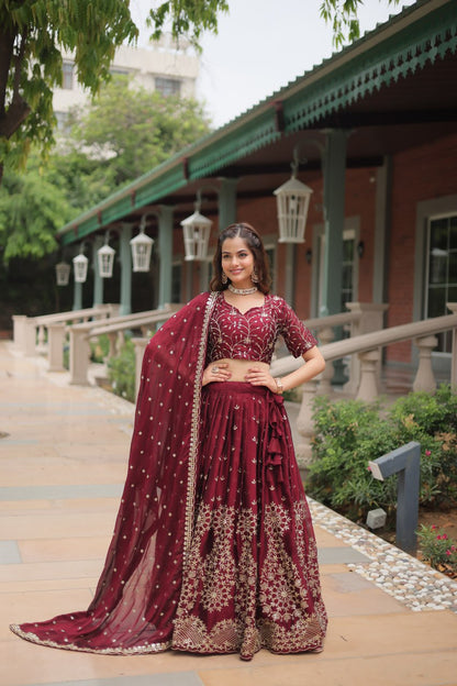 Maroon Color Rangoli Silk With Heavy Sequins And Thread Embroidered Work Lehenga