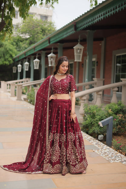 Maroon Color Rangoli Silk With Heavy Sequins And Thread Embroidered Work Lehenga