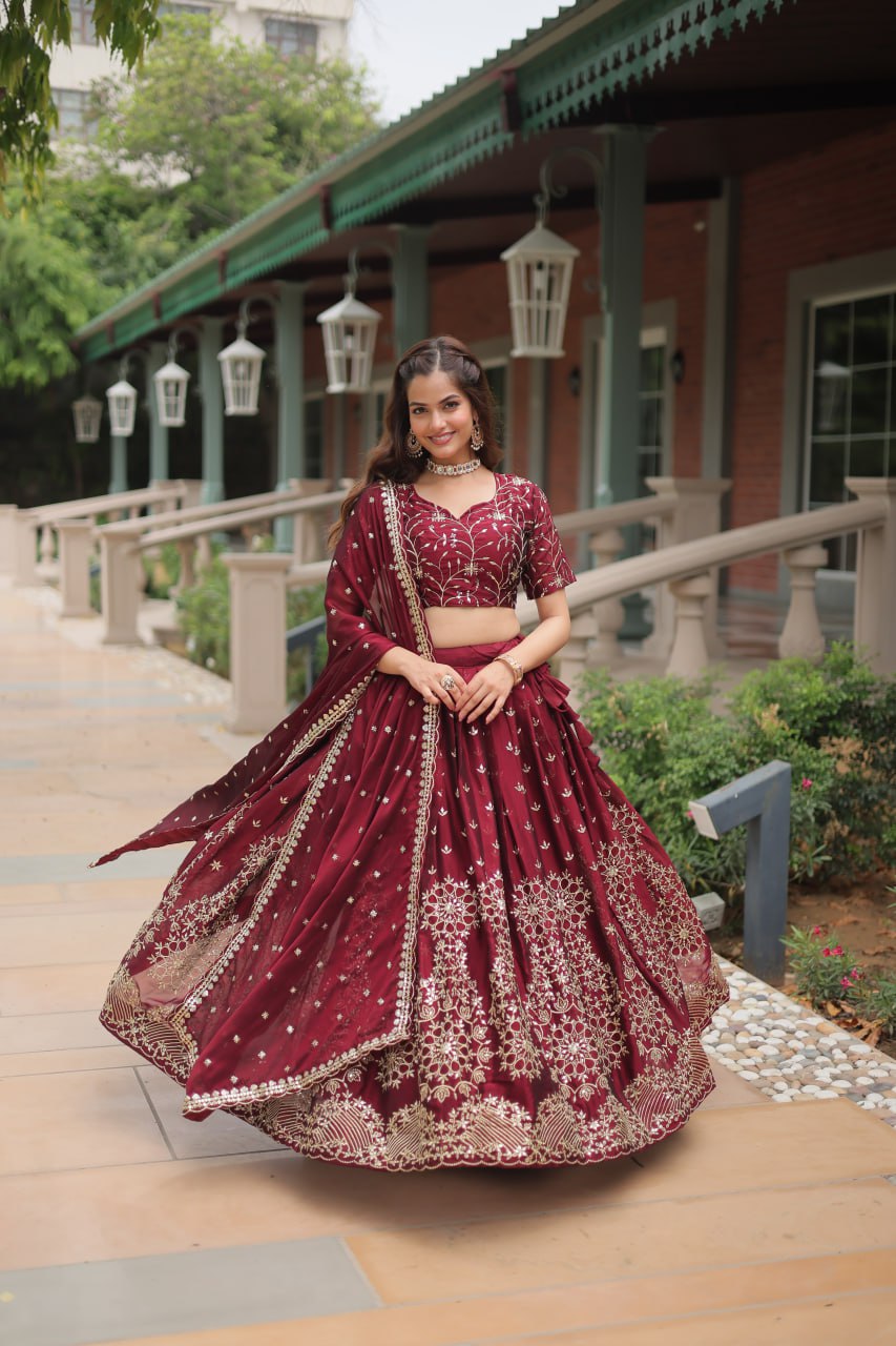 Maroon Color Rangoli Silk With Heavy Sequins And Thread Embroidered Work Lehenga