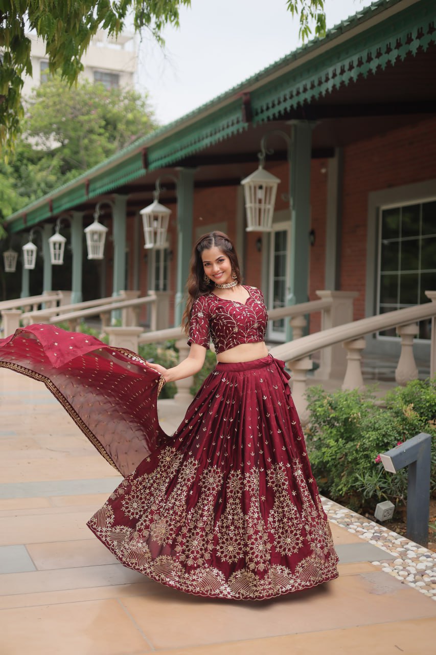 Maroon Color Rangoli Silk With Heavy Sequins And Thread Embroidered Work Lehenga