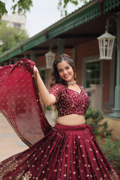 Maroon Color Rangoli Silk With Heavy Sequins And Thread Embroidered Work Lehenga