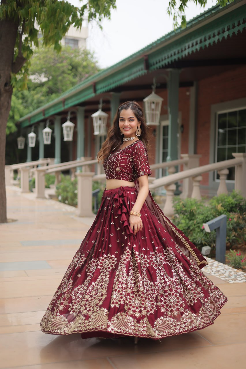 Maroon Color Rangoli Silk With Heavy Sequins And Thread Embroidered Work Lehenga