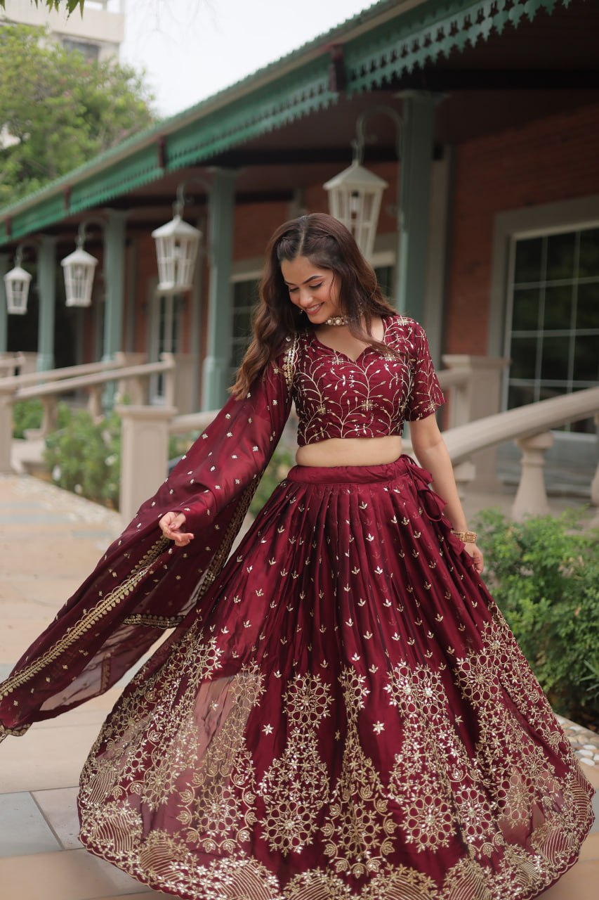 Maroon Color Rangoli Silk With Heavy Sequins And Thread Embroidered Work Lehenga