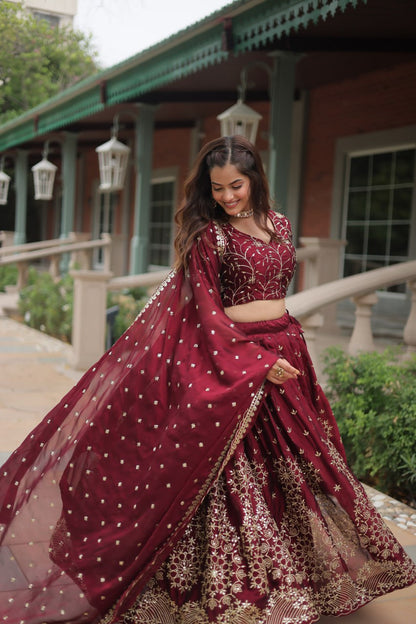 Maroon Color Rangoli Silk With Heavy Sequins And Thread Embroidered Work Lehenga