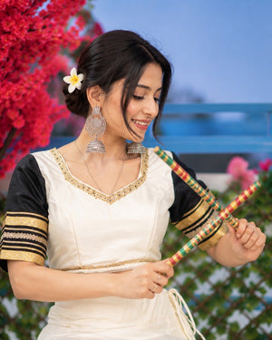 Navratri lehenga off-white rayon with gold sequins lace and black hem border
