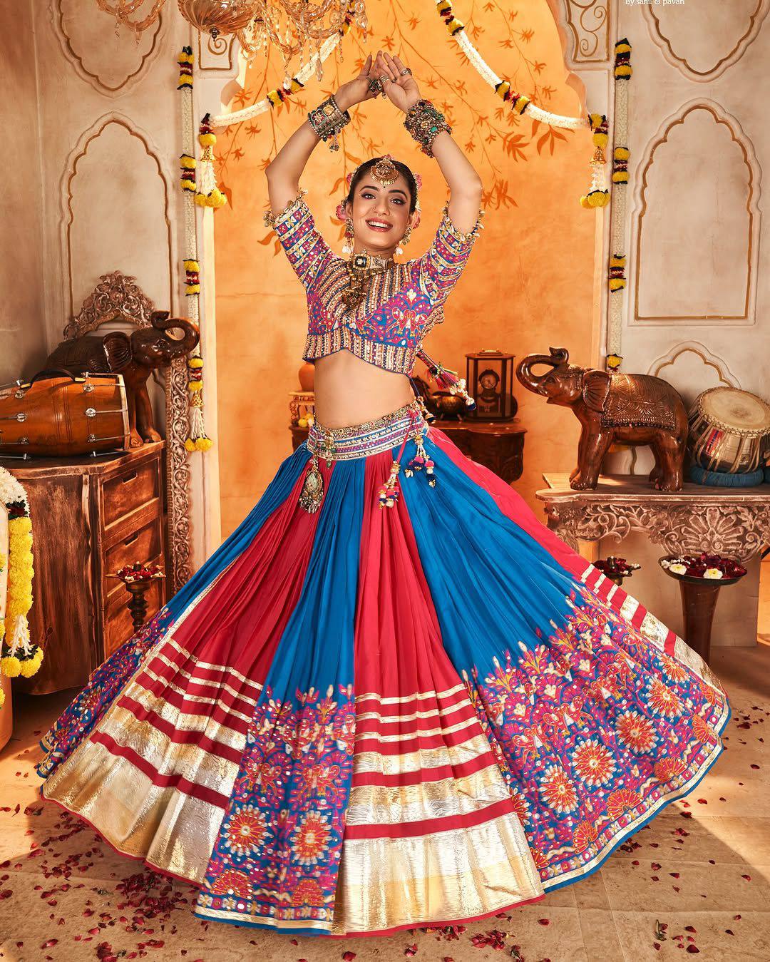 Pink and blue Navratri chaniya choli with Kutchi mirror work
