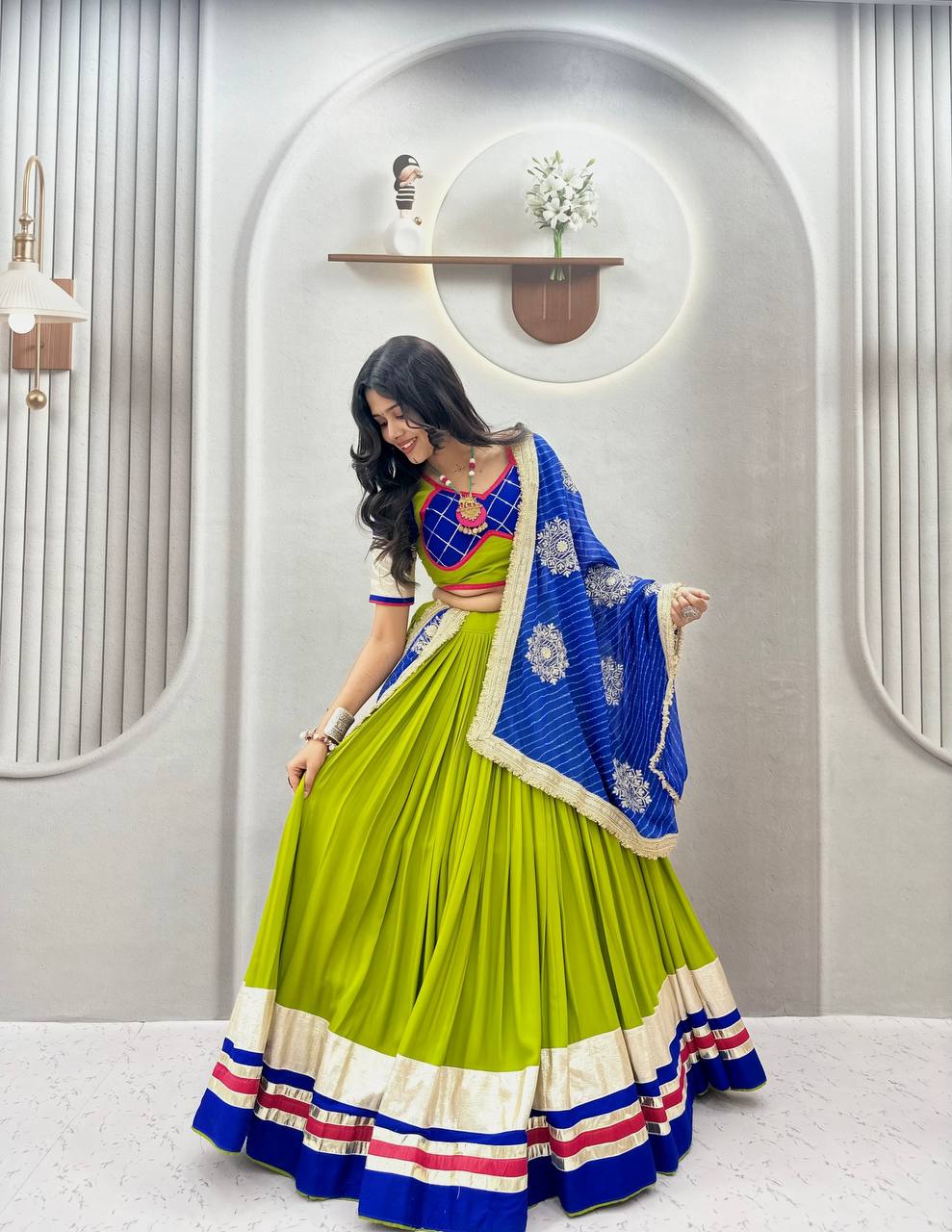 Parrot green and royal blue pure cotton Navratri lehenga choli with heavy ribbon work, Lampi lace border, and embroidered dupatta