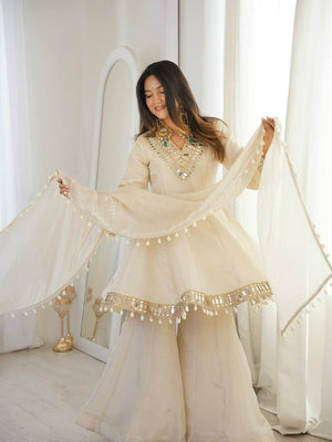 Off White Organza Silk Sharara Set with Real Mirror Work and Lace Border by The Beauty Queen Surat