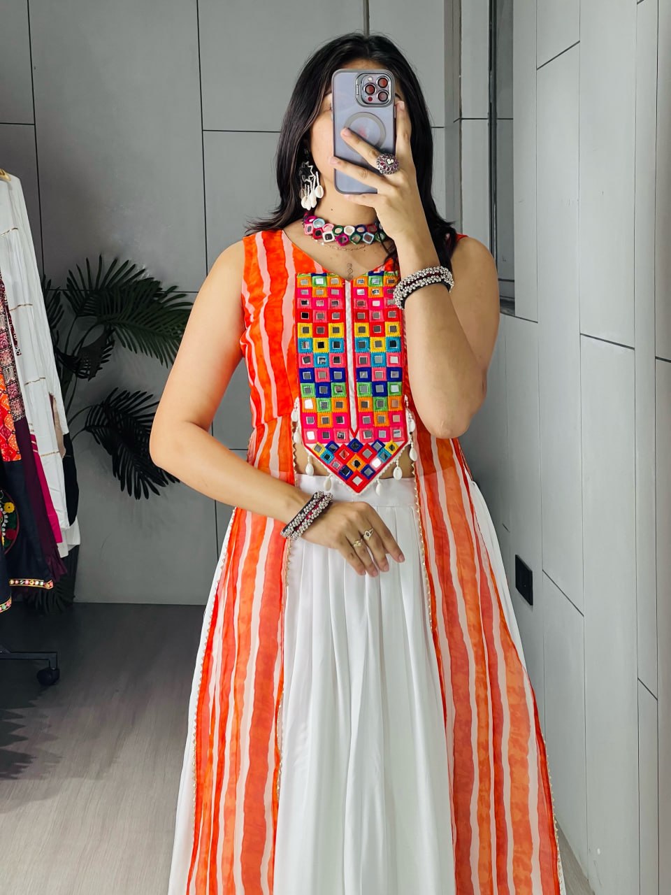 Garba chaniya choli white frill skirt with mirror work yoke and moti tassels
