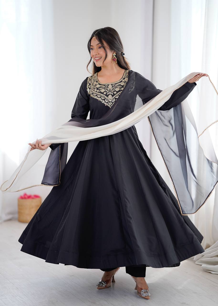 Black Pure Soft Heavy French Crape Kalicut Anarkali Suit with gold embroidery and black-cream shaded dupatta by The Beauty Queen Surat.