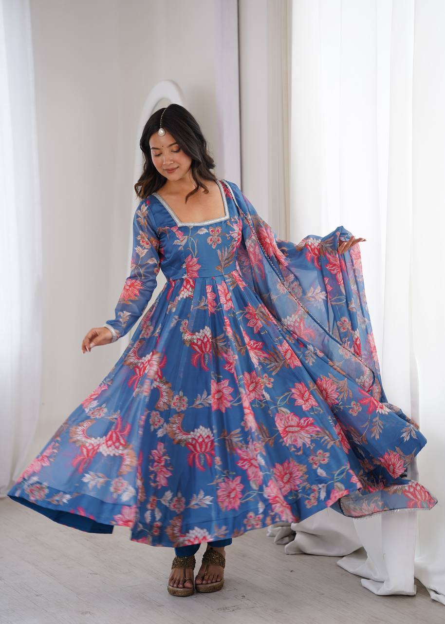 Dusty Blue Pure Soft Organza Floral Print Anarkali Suit with silver lace neckline by The Beauty Queen Surat.