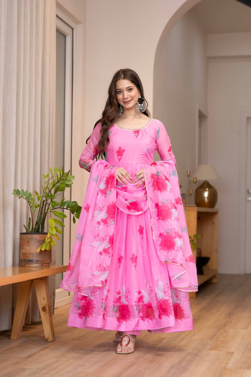 Pink Pure Soft Organza Floral Print Umbrella Suit with lace neckline by The Beauty Queen Surat.
