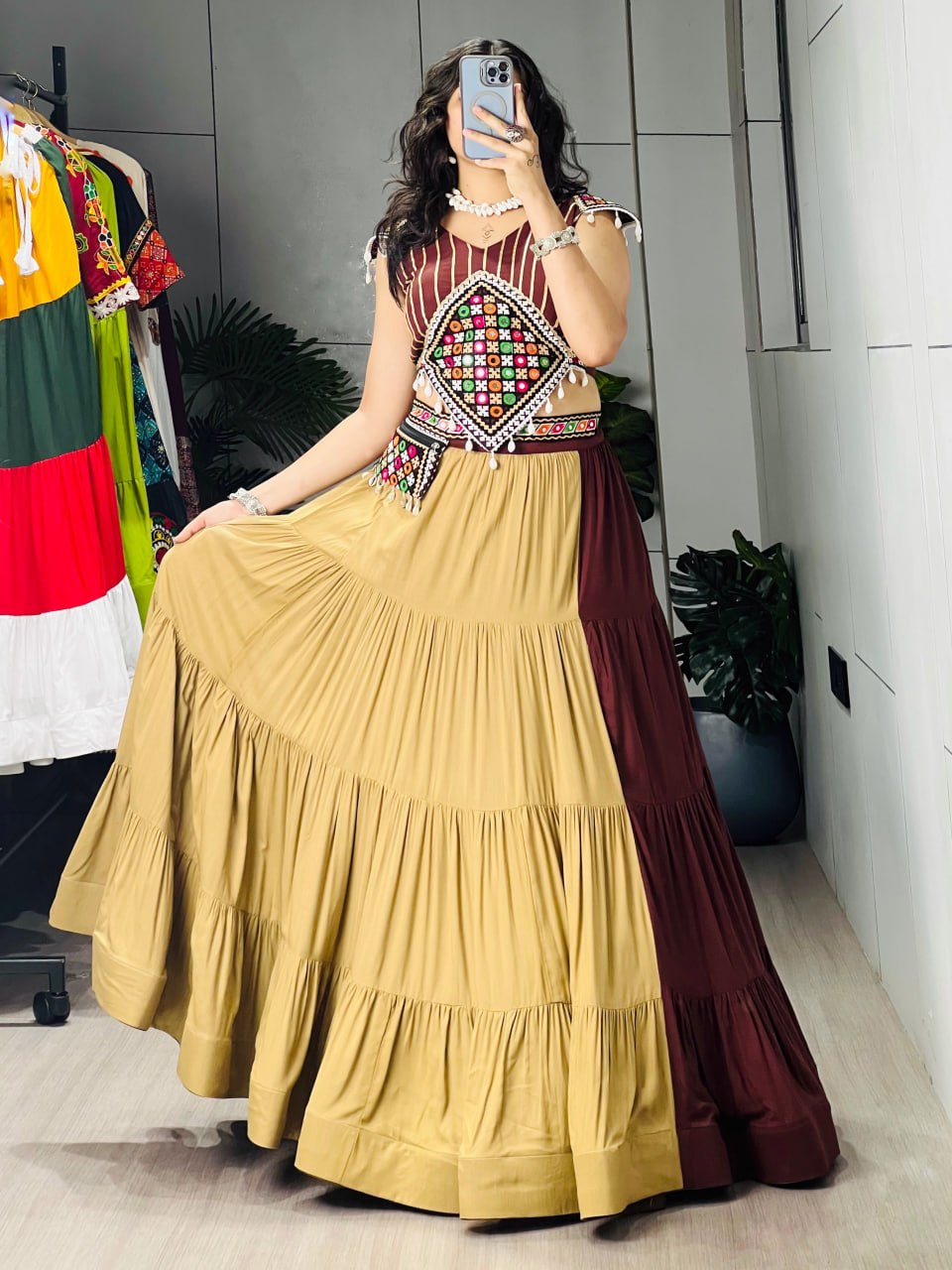 Brown and beige rayon cotton frilled Navratri chaniya choli with Kutchi mirror work and kodi tassels
