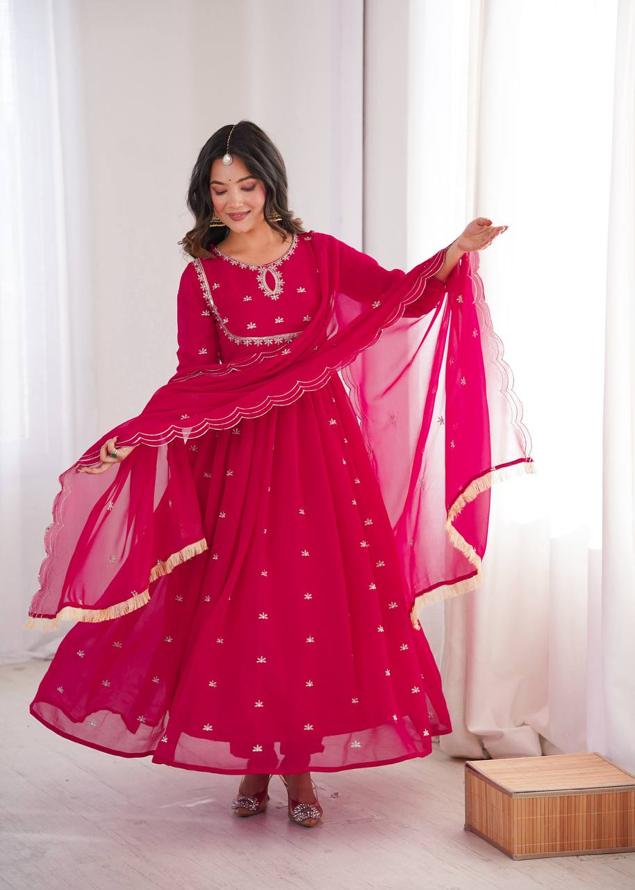 Rani Pink Georgette Anarkali Suit featuring sequence and thread embroidery work on the yoke with a scallop border dupatta by The Beauty Queen