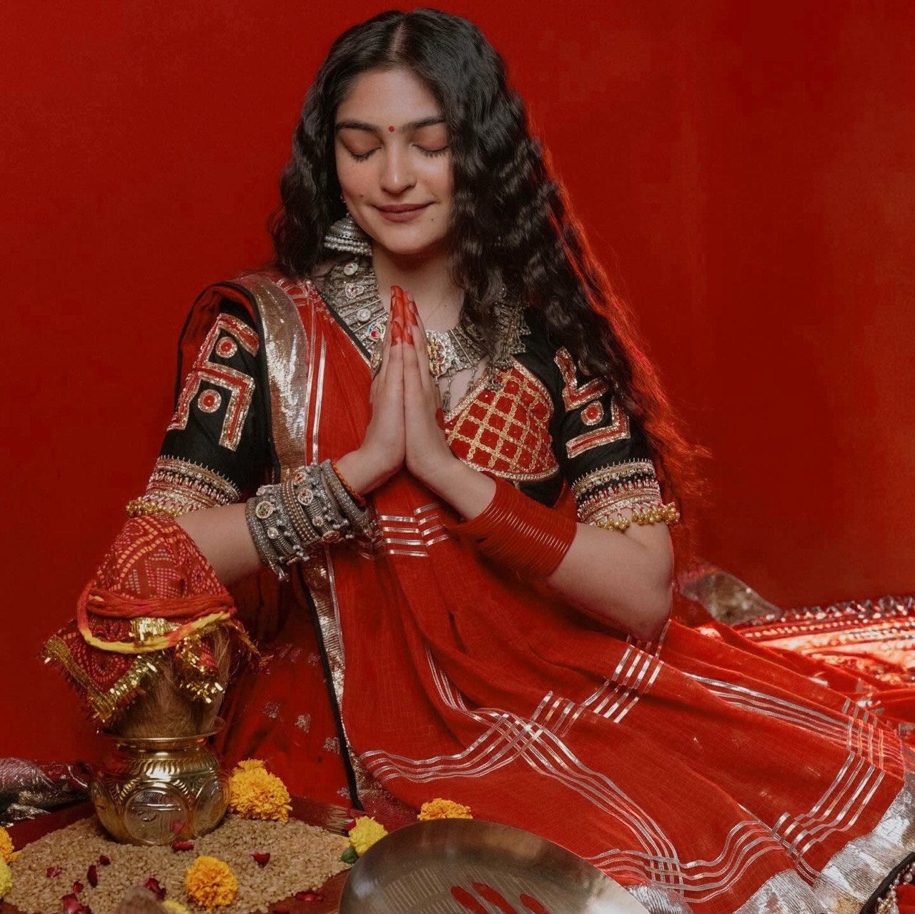 Navratri lehenga red French crepe with broad gold lampi lace border and black blouse
