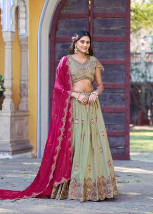 Pista Green and Rani Pink Star Georgette Lehenga Choli with Zari and Resham Embroidery by The Beauty Queen Surat