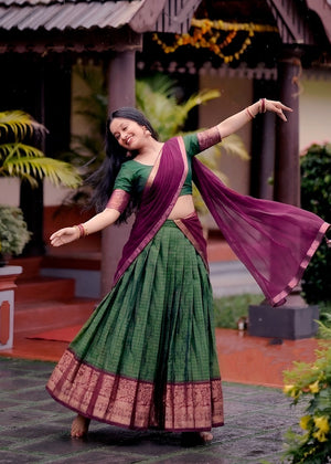 Green and Purple Dola Silk Lehenga with Chex Pattern and Traditional Zari Weaving Work by The Beauty Queen Surat