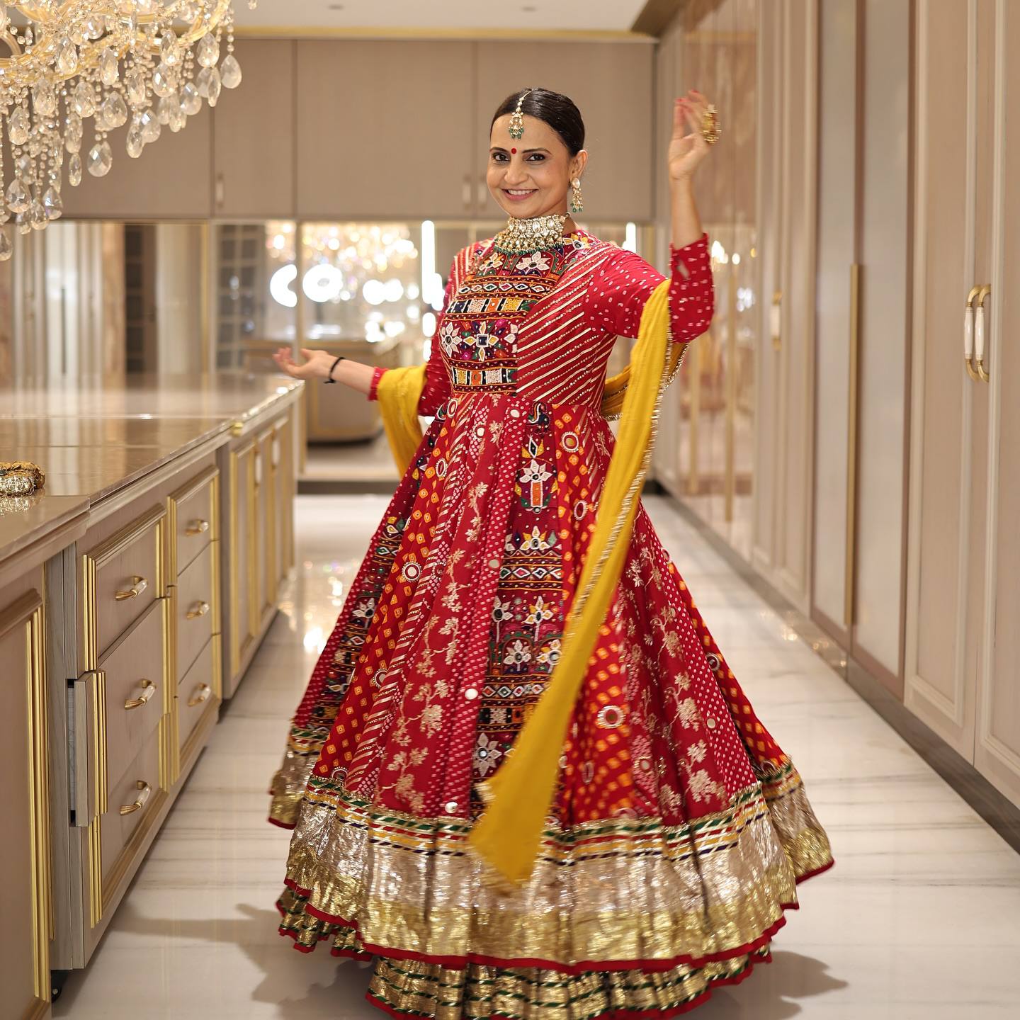Red digital print Navratri lehenga choli with mustard yellow gota dupatta