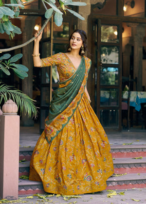 Mustard Yellow Tasar Silk Lehenga with Sea Green Dupatta and Gilded Motif Floral Print by The Beauty Queen Surat