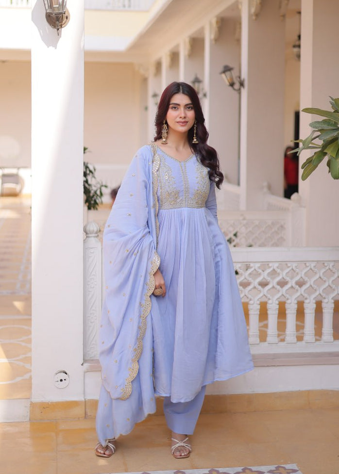 Powder Blue Mal Chanderi Anarkali Suit with gold beads embroidery and scalloped dupatta by The Beauty Queen Surat.